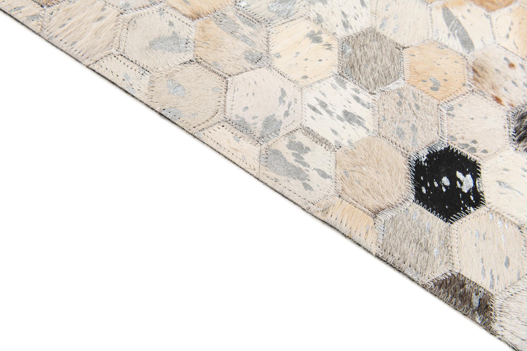 5' x 7' 9 Cowhide Stocks Rug