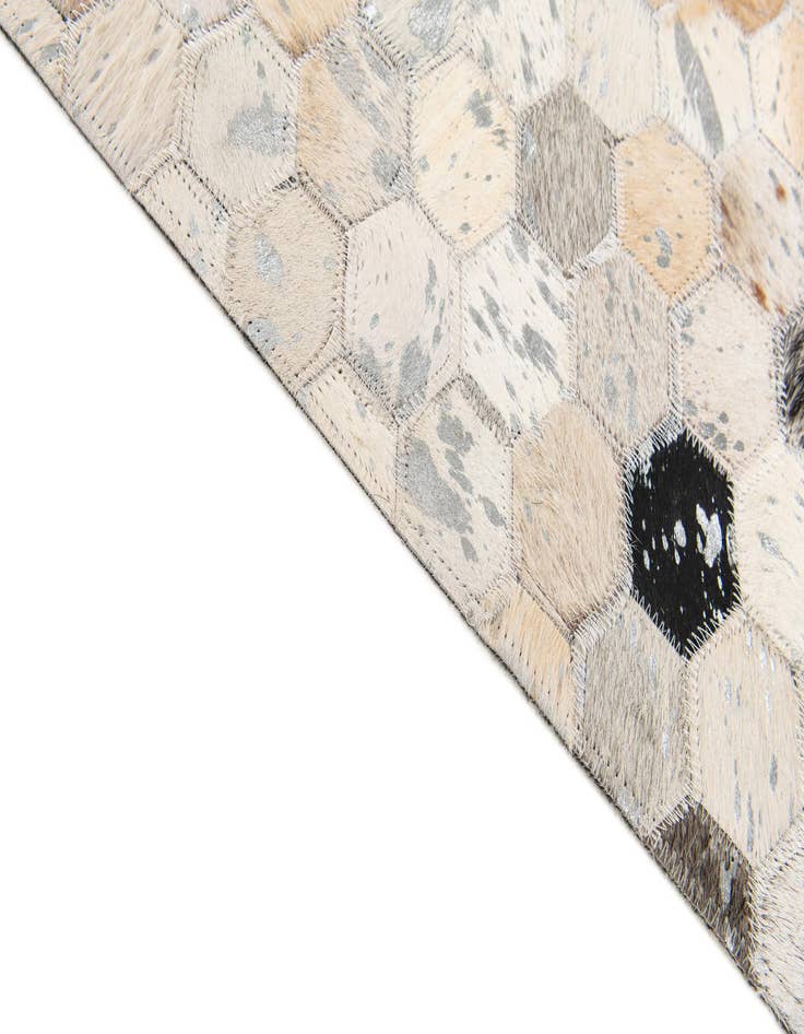 Detail image of 5' x 7' 9 Cowhide Stocks Rug