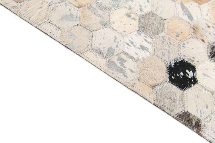 5' x 7' 9 Cowhide Stocks Rug