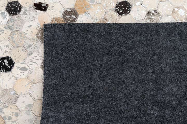 5' x 7' 9 Cowhide Stocks Rug