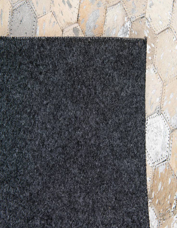 Detail image of 5' 3 x 7' 7 Cowhide Stocks Rug