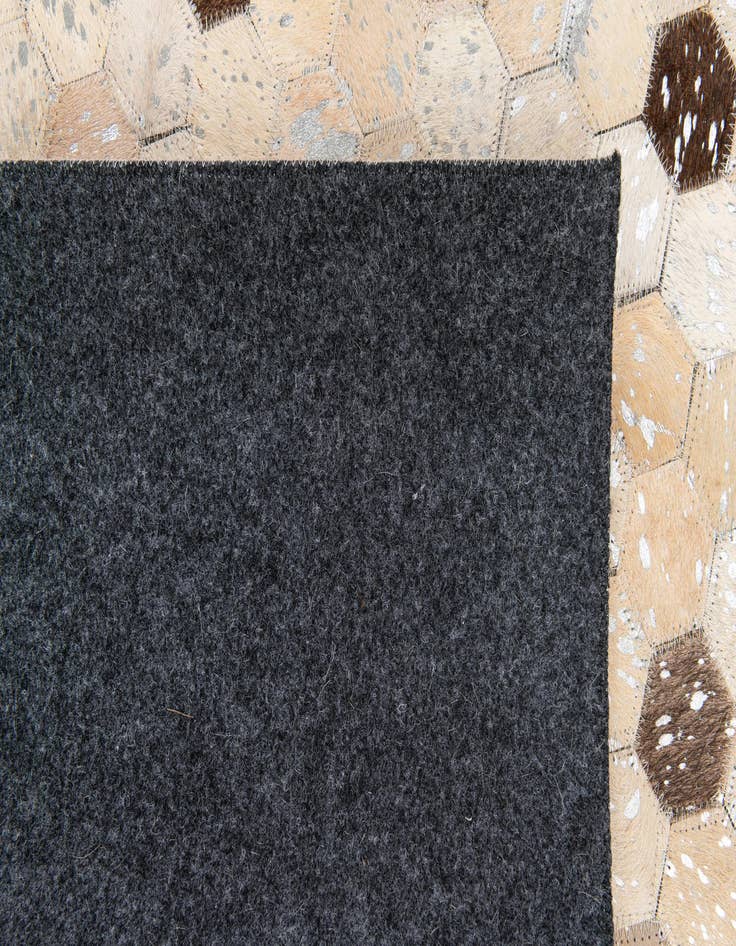 Detail image of 5' 3 x 7' 4 Cowhide Stocks Rug
