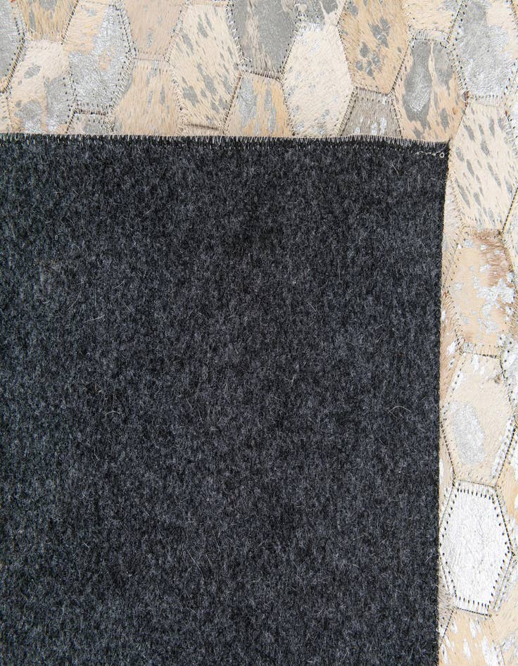 Detail image of 5' 3 x 7' 8 Cowhide Stocks Rug