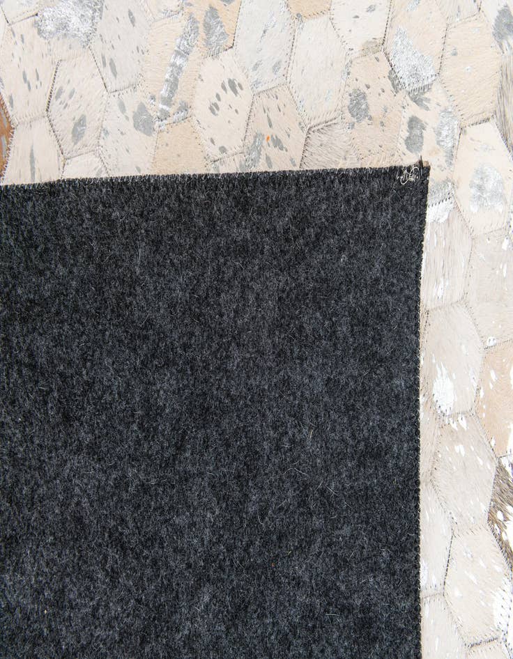 Detail image of 5' x 7' 11 Cowhide Stocks Rug