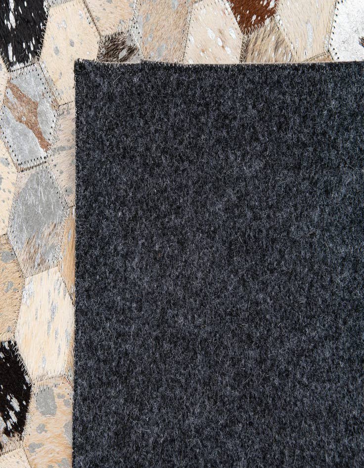 Detail image of 5' 4 x 7' 6 Cowhide Stocks Rug
