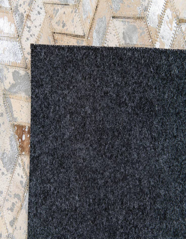 Detail image of 5' 3 x 7' 3 Cowhide Stocks Rug