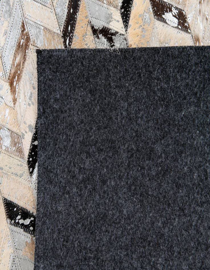 Detail image of 5' 4 x 7' 6 Cowhide Stocks Rug
