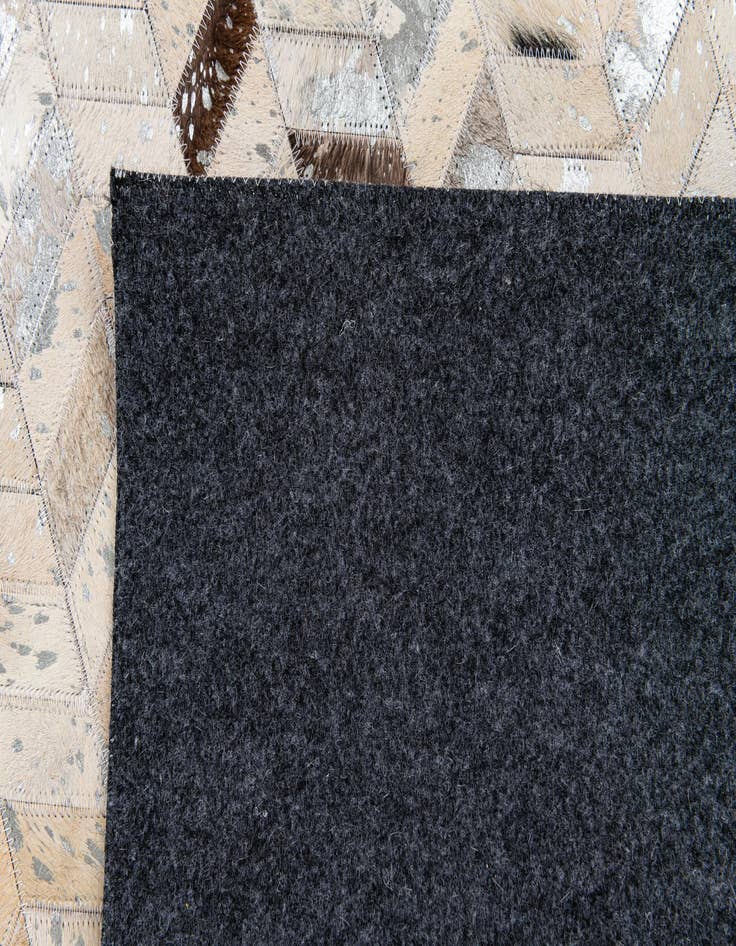 Detail image of 5' 4 x 7' 7 Cowhide Stocks Rug