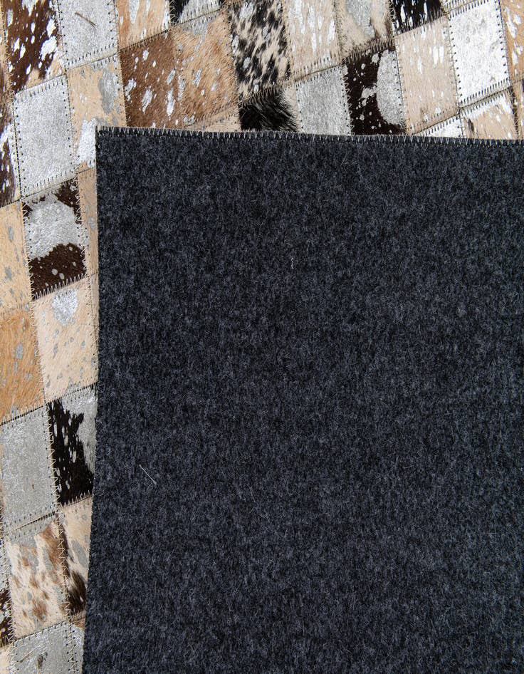 Detail image of 5' 3 x 7' 3 Cowhide Stocks Rug