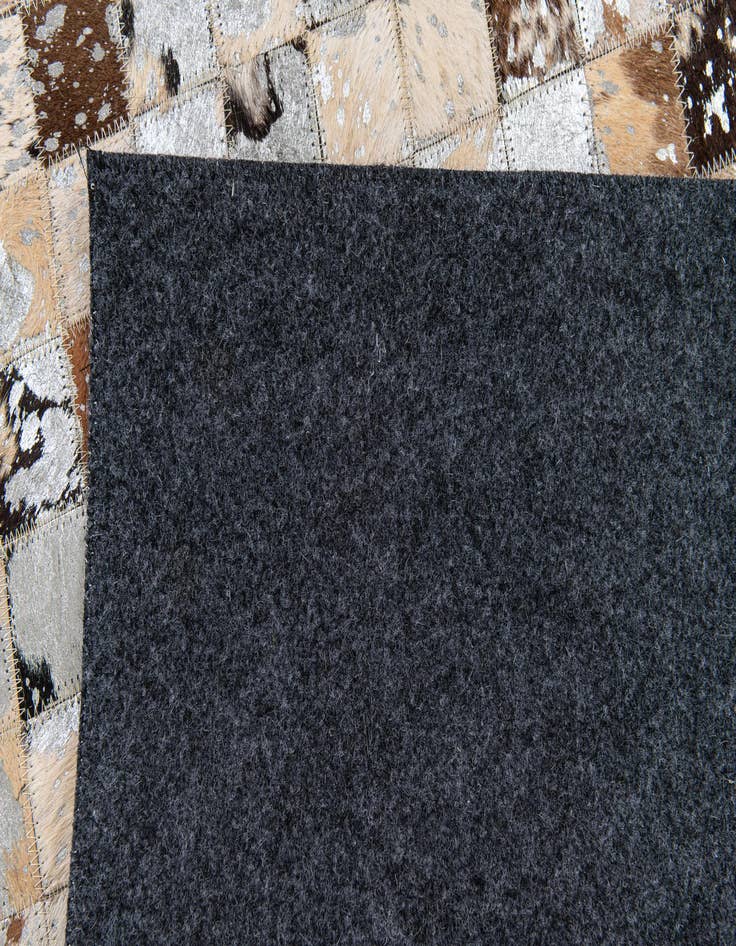 Detail image of 5' 2 x 7' 3 Cowhide Stocks Rug