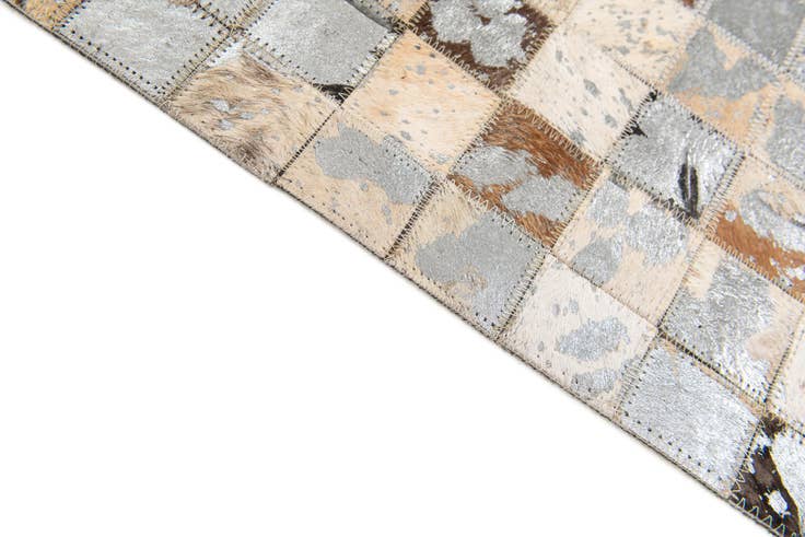 Detail image of 5' 2 x 7' 3 Cowhide Stocks Rug