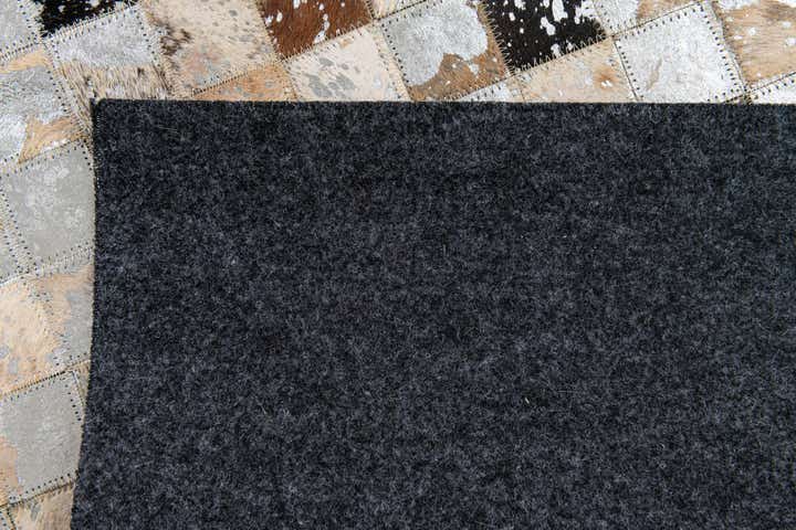 5' 2 x 7' 3 Cowhide Stocks Rug