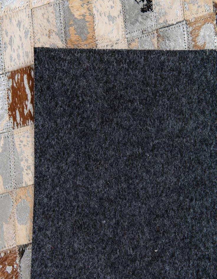 Detail image of 5' x 7' 3 Cowhide Stocks Rug