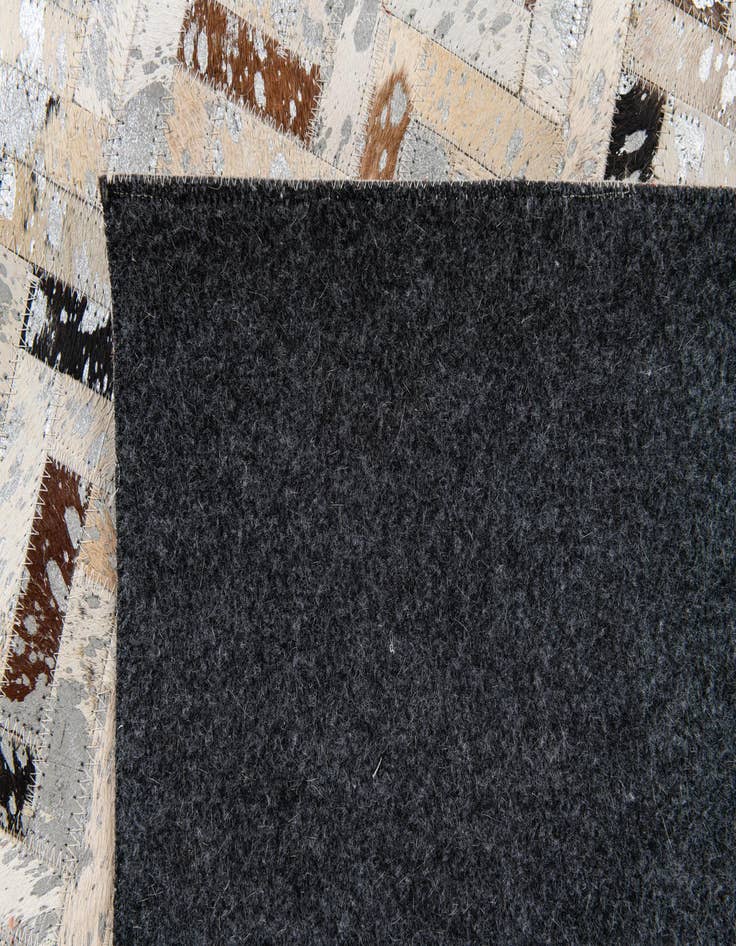 Detail image of 5' 4 x 7' 6 Cowhide Stocks Rug