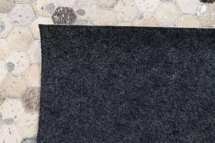 5' x 8' Cowhide Stocks Rug