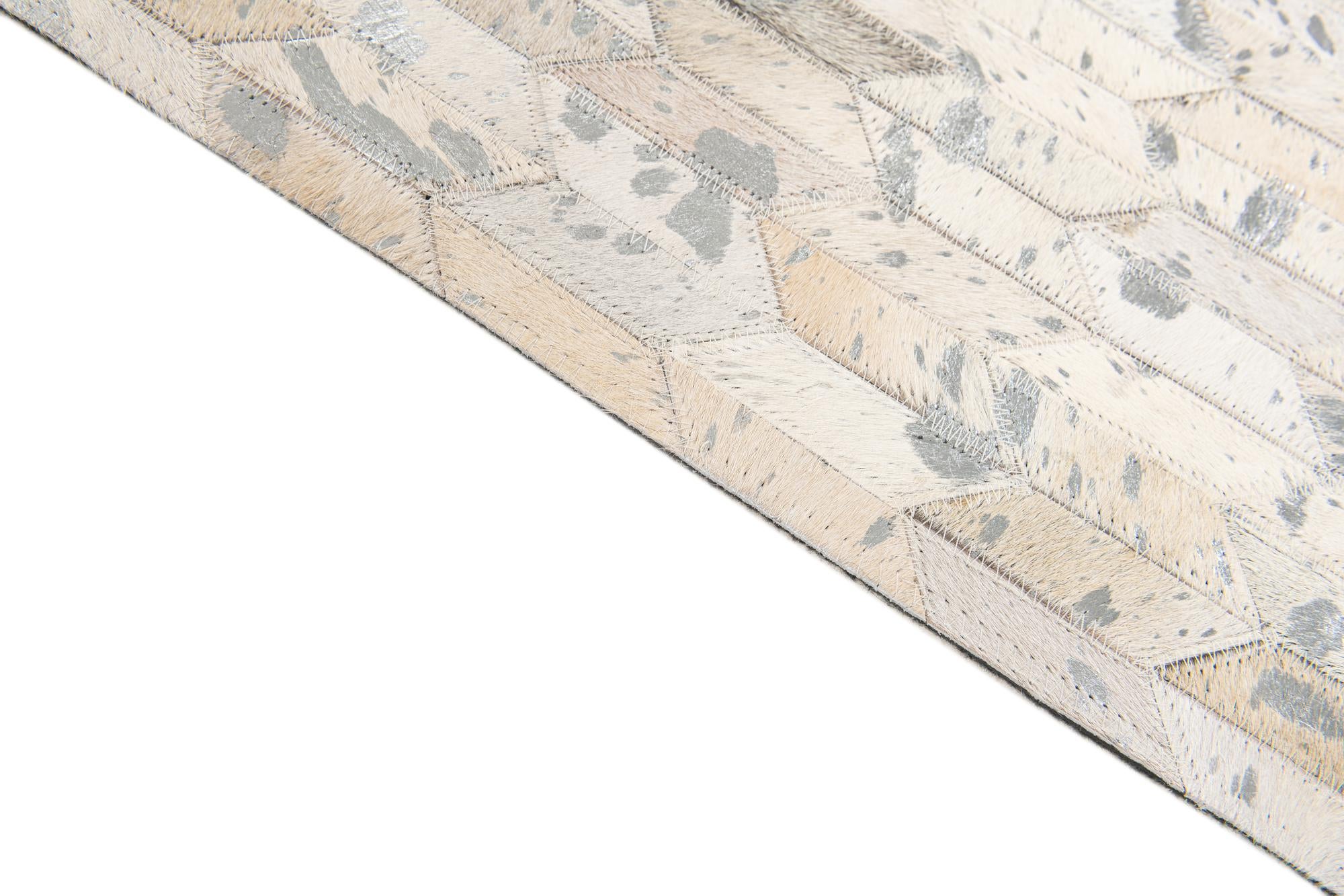 4' 11 x 8' Cowhide Stocks Rug