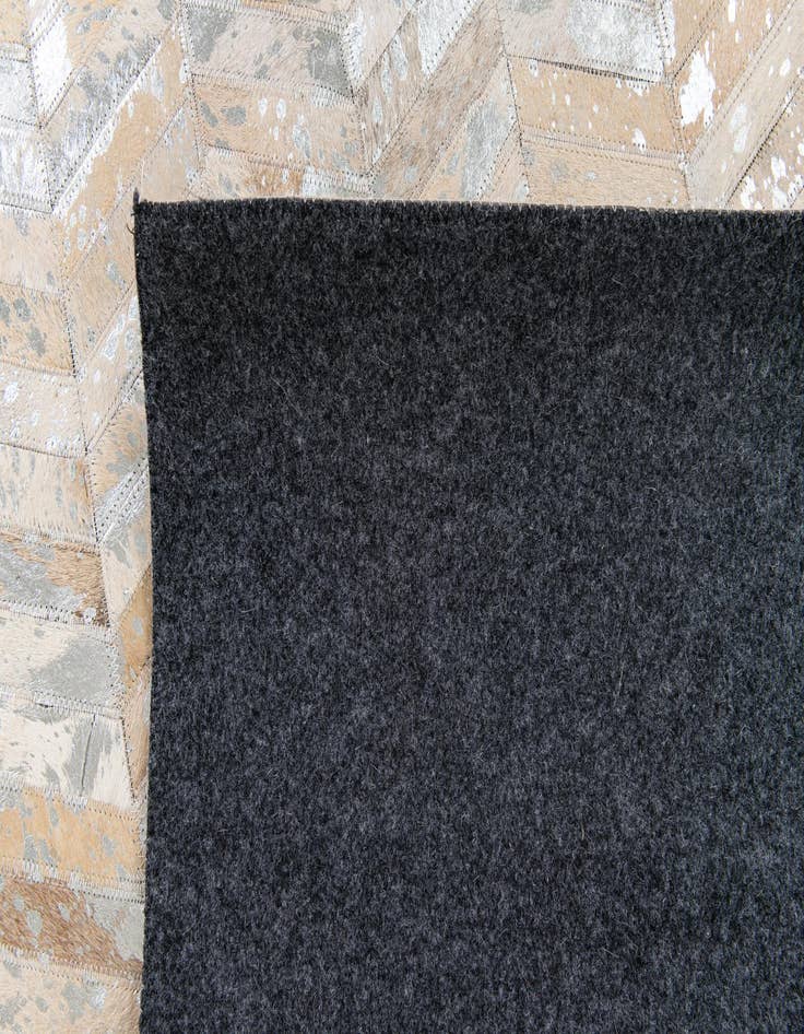 Detail image of 5' 6 x 7' 7 Cowhide Stocks Rug