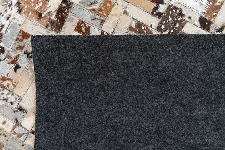5' 2 x 7' 6 Cowhide Stocks Rug