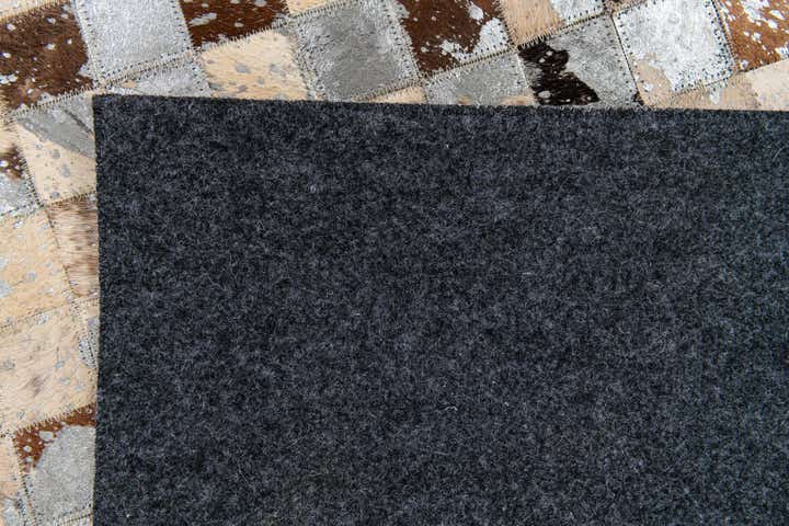 5' x 7' 3 Cowhide Stocks Rug