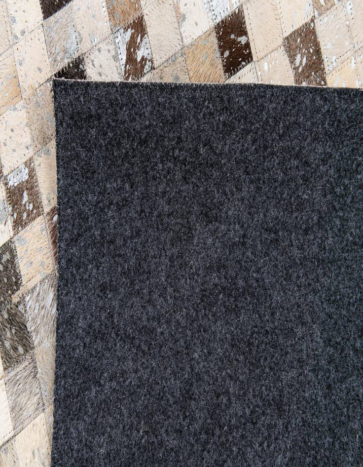 Detail image of 5' 3 x 7' 6 Cowhide Stocks Rug