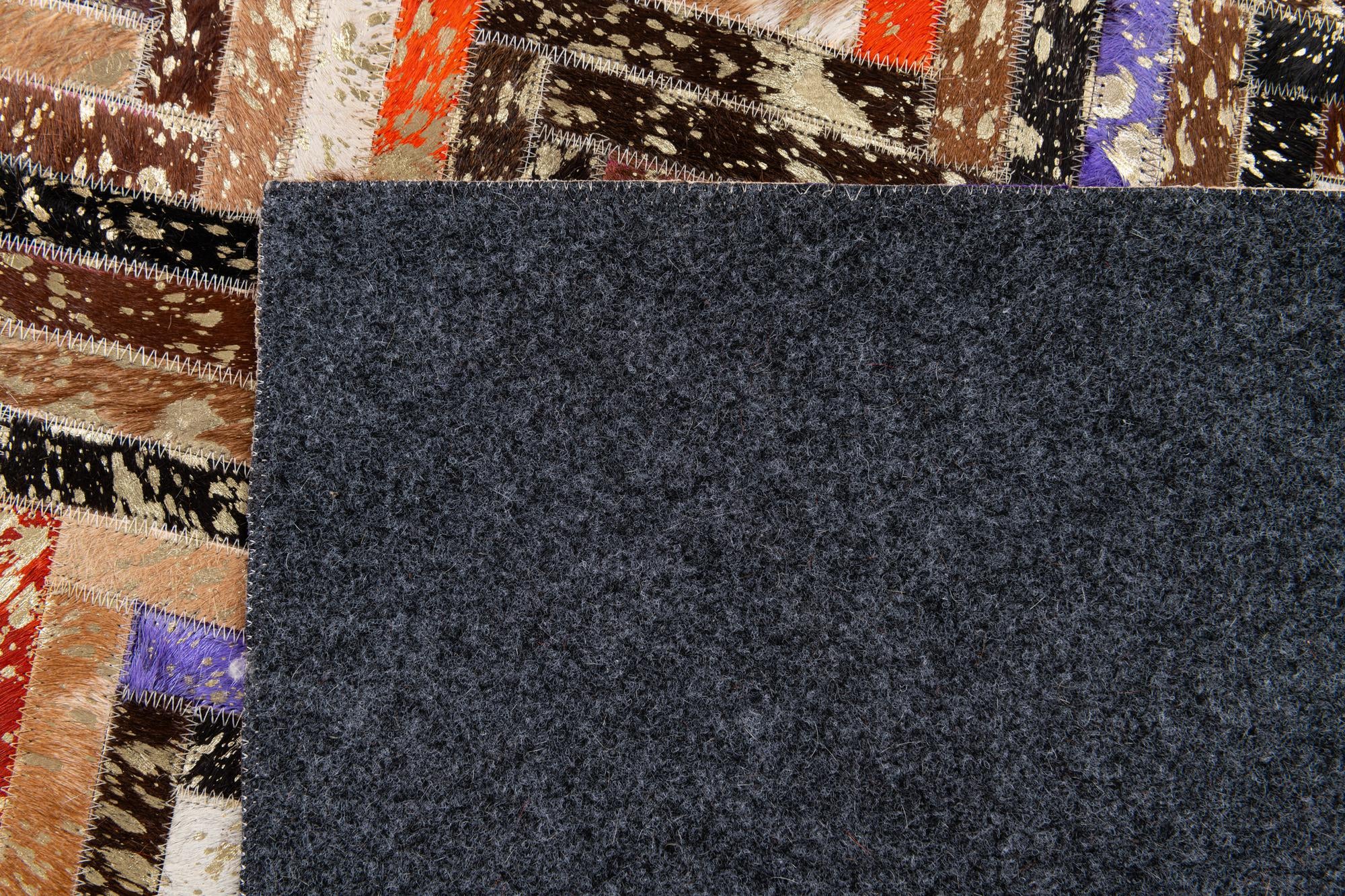 5' x 7' 8 Cowhide Stocks Rug