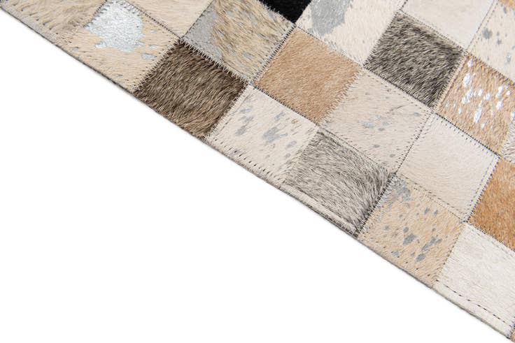 Detail image of 5' 2 x 8' 2 Cowhide Stocks Rug