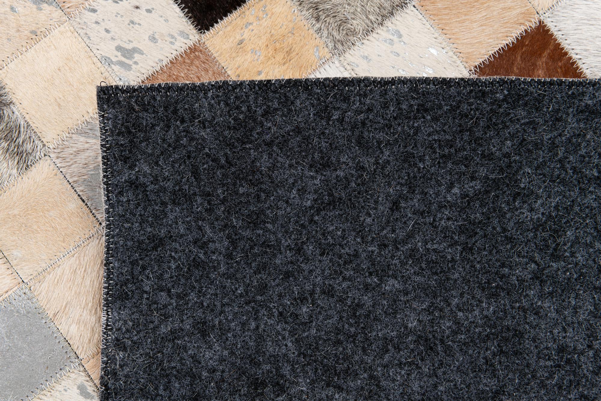 5' 2 x 8' 2 Cowhide Stocks Rug