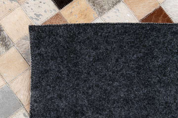 5' 2 x 8' 2 Cowhide Stocks Rug