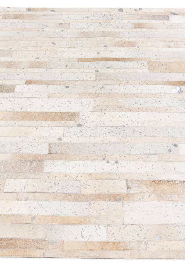 Detail image of 5' 1 x 8' 1 Cowhide Stocks Rug