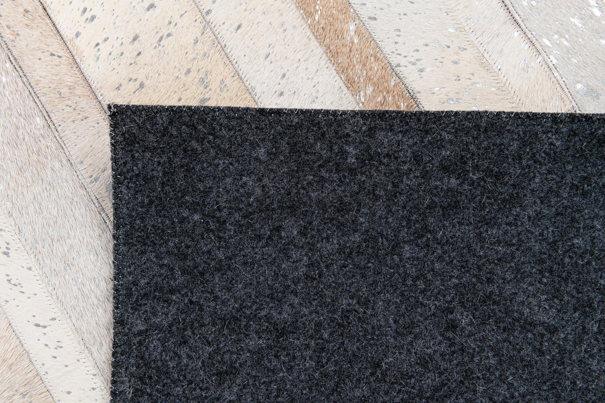 5' 1 x 8' 1 Cowhide Stocks Rug