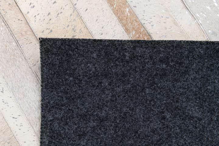 5' 1 x 8' 1 Cowhide Stocks Rug