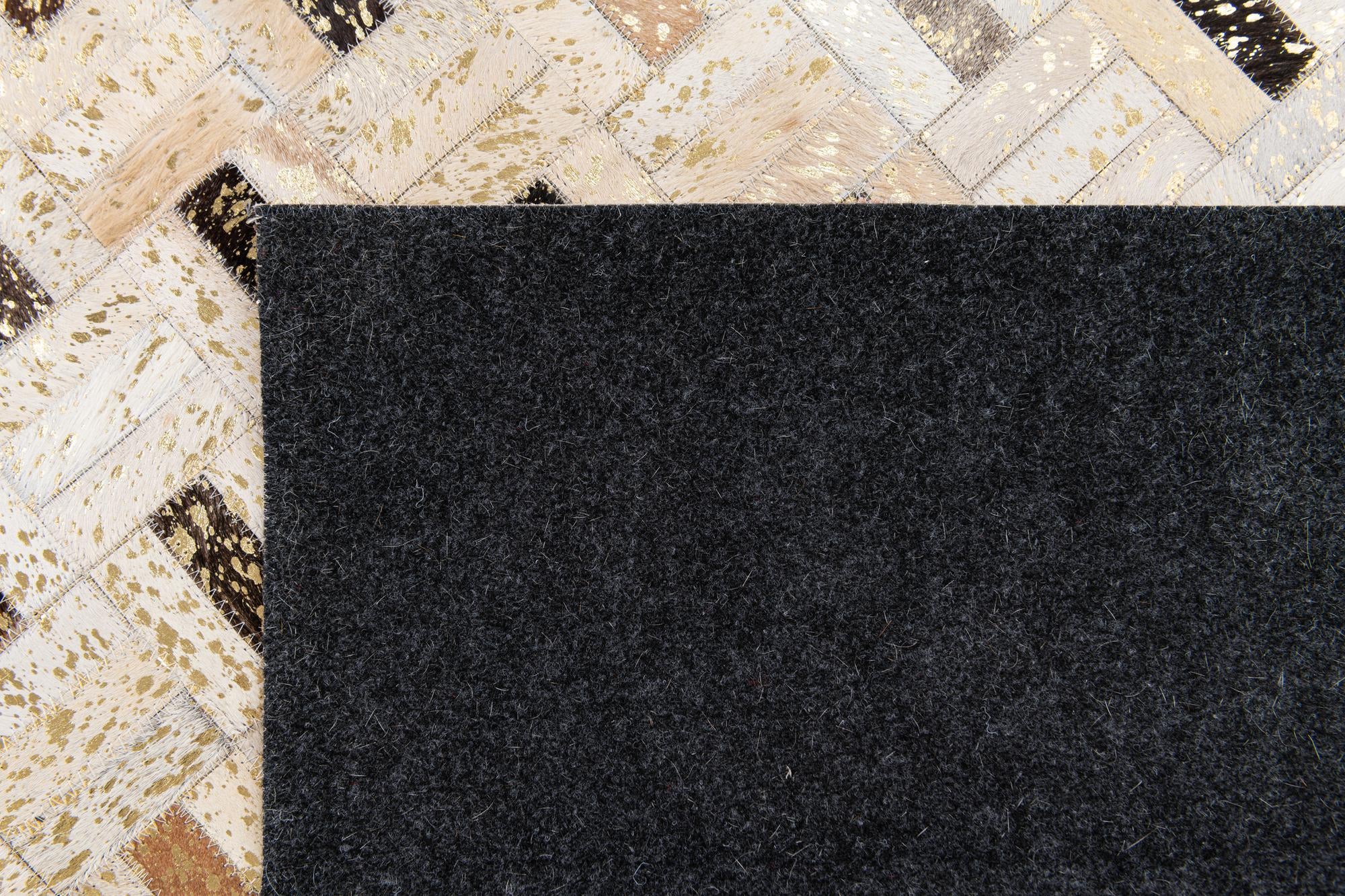 5' 2 x 8' Cowhide Stocks Rug