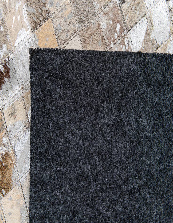 Detail image of 5' 4 x 7' 7 Cowhide Stocks Rug
