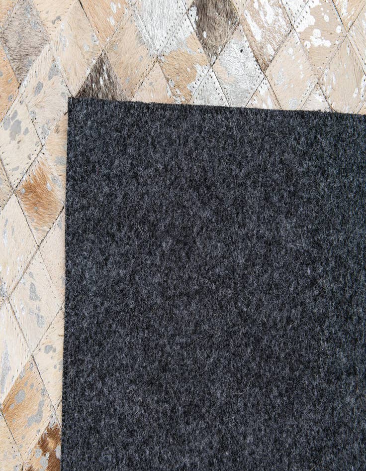 Detail image of 5' 3 x 7' 5 Cowhide Stocks Rug