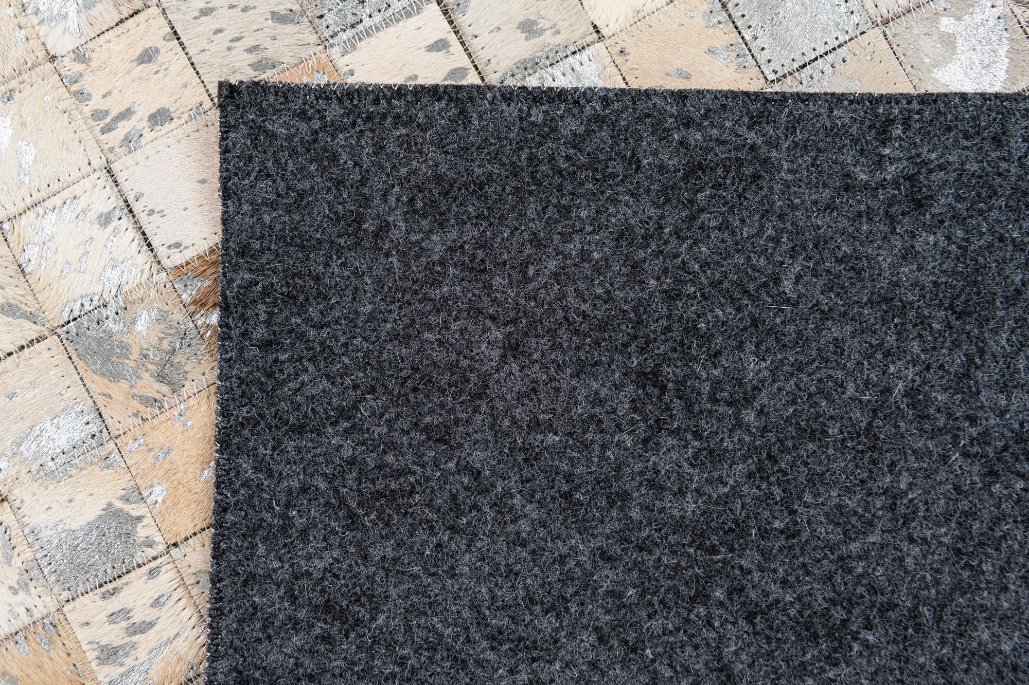 5' 2 x 7' 5 Cowhide Stocks Rug