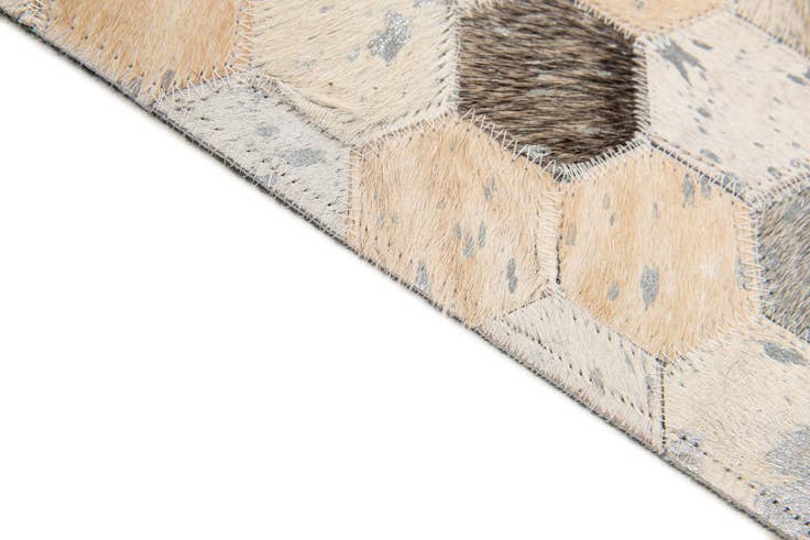 Detail image of 5' 1 x 8' 1 Cowhide Stocks Rug