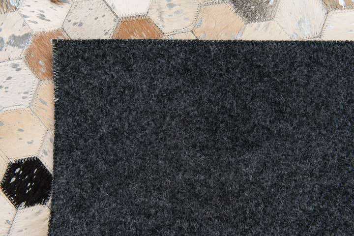 5' 1 x 8' 1 Cowhide Stocks Rug