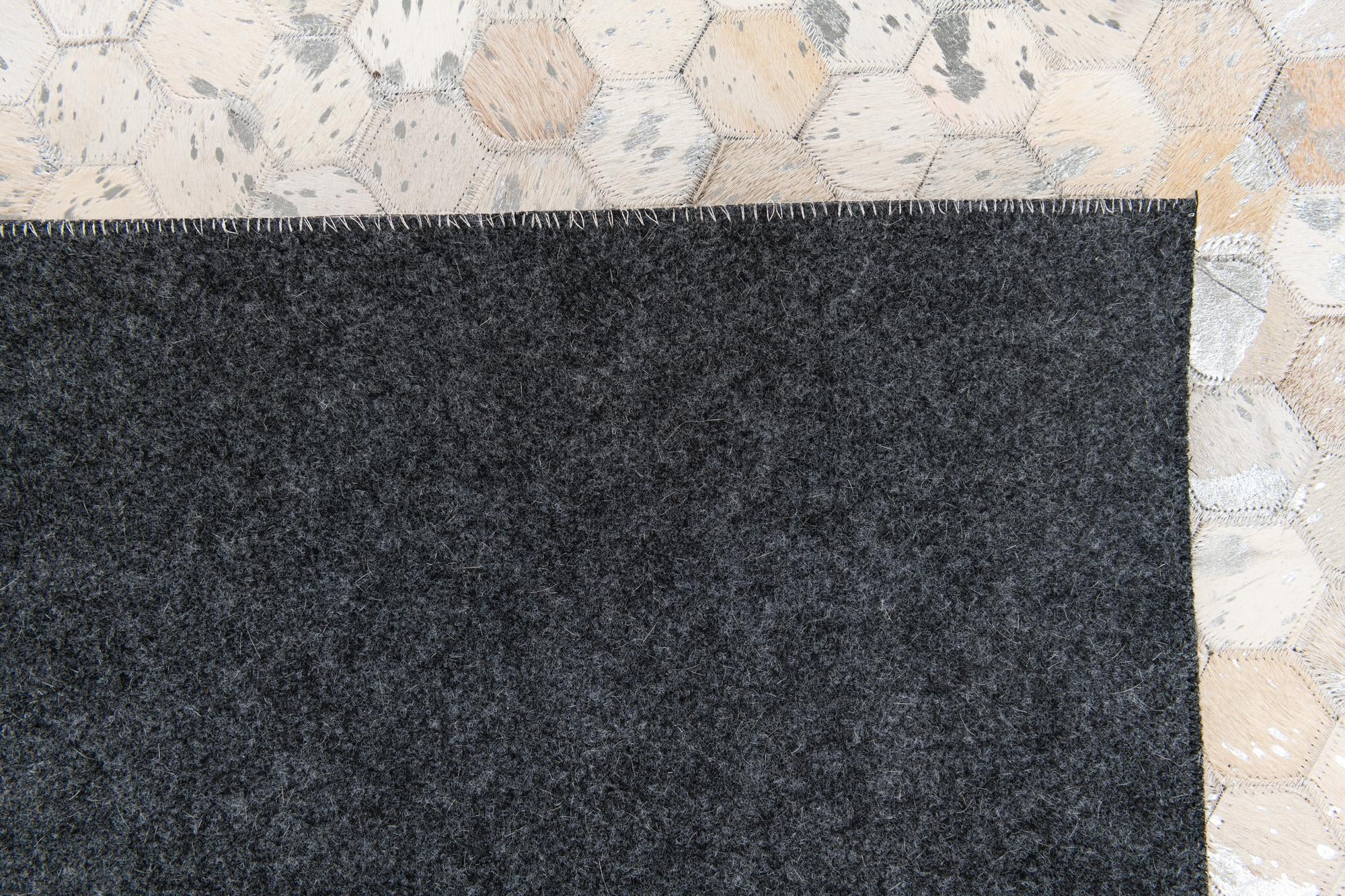 5' x 7' 11 Cowhide Stocks Rug