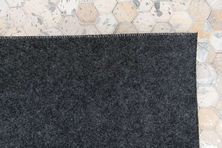 5' x 7' 11 Cowhide Stocks Rug