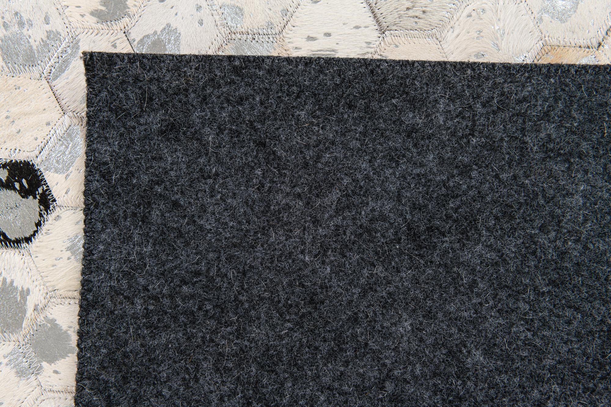 5' 1 x 7' 11 Cowhide Stocks Rug