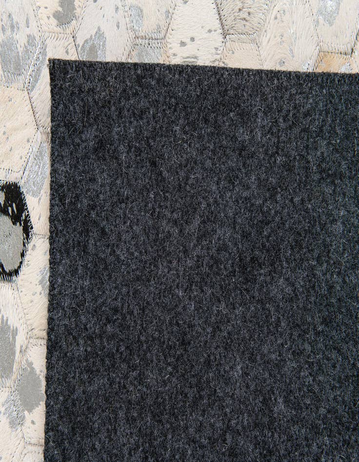 Detail image of 5' 1 x 7' 11 Cowhide Stocks Rug