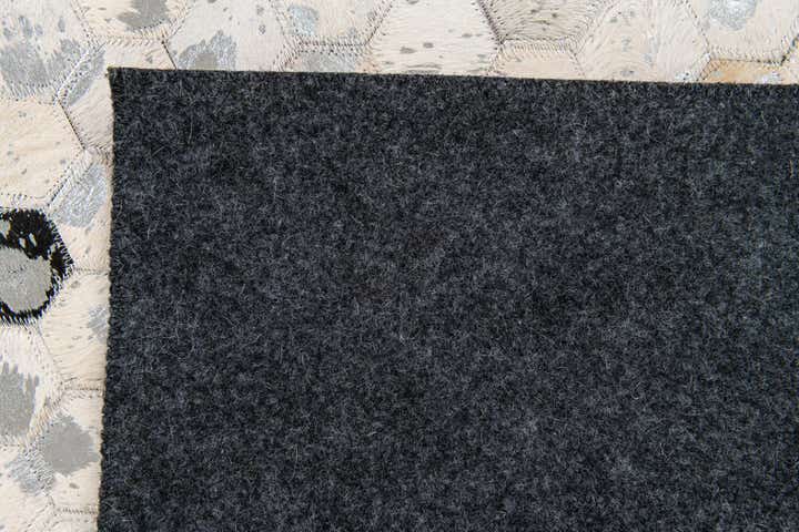 5' 1 x 7' 11 Cowhide Stocks Rug