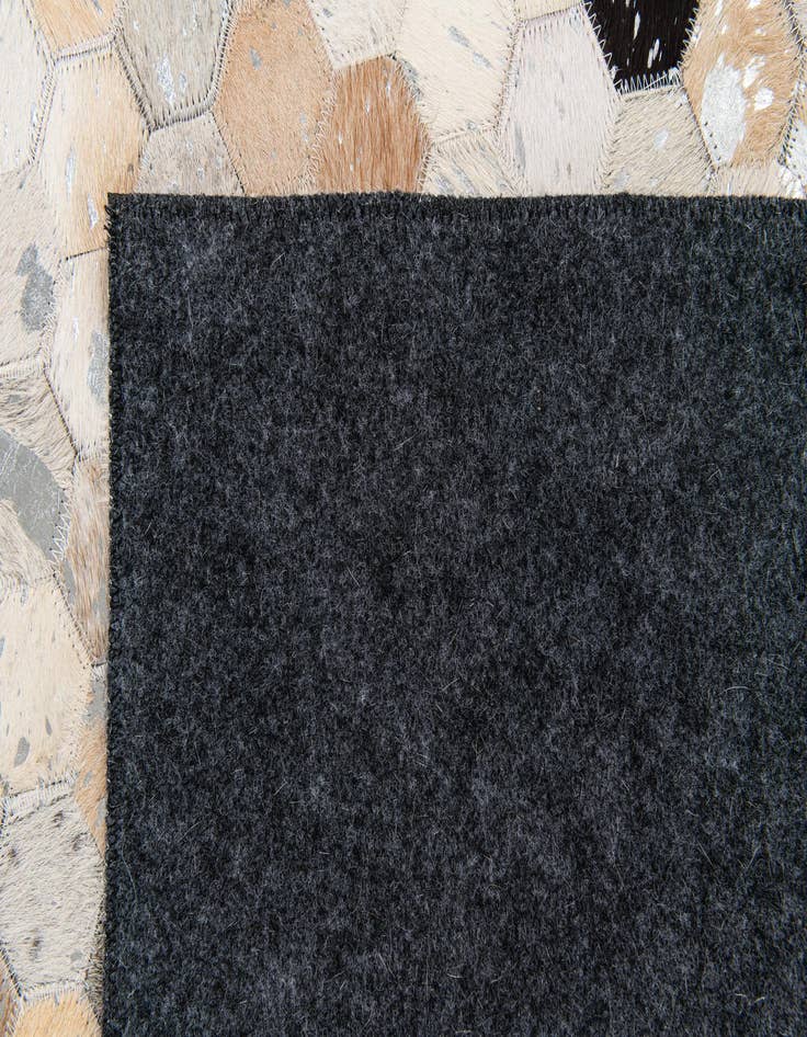 Detail image of 5' 1 x 7' 9 Cowhide Stocks Rug