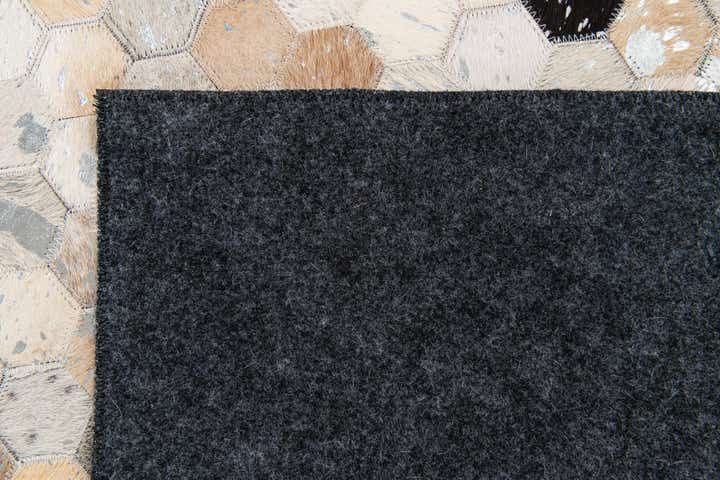 5' 1 x 7' 9 Cowhide Stocks Rug