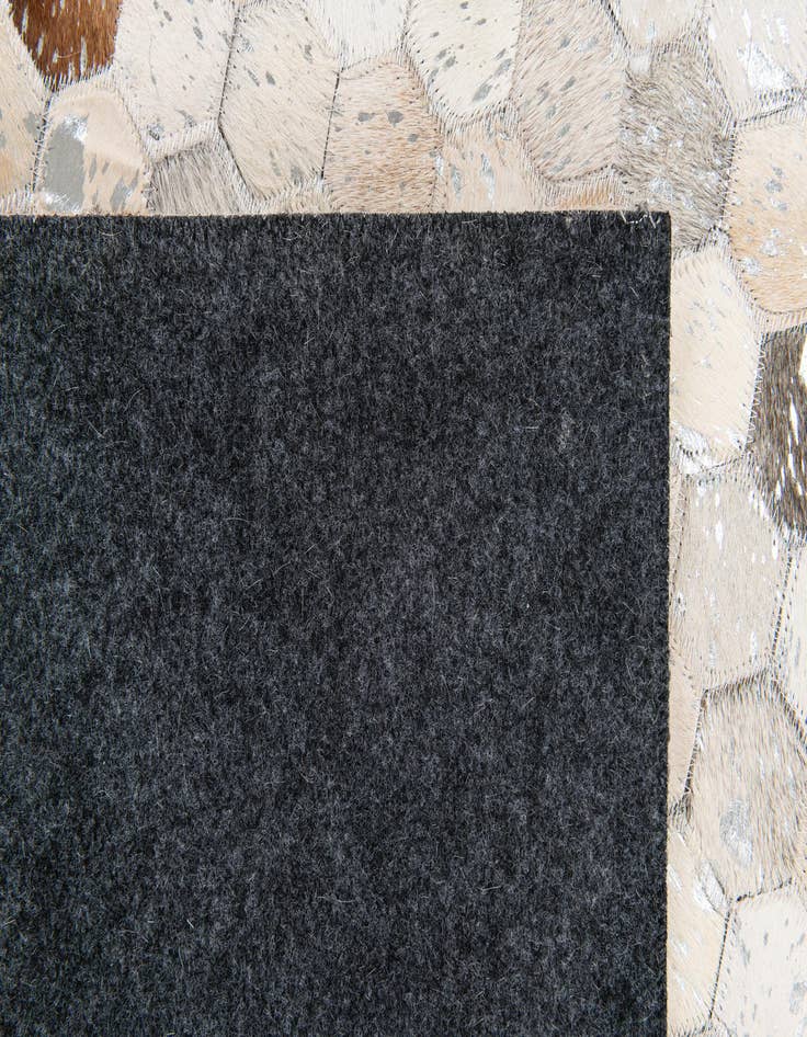 Detail image of 5' 1 x 8' Cowhide Stocks Rug