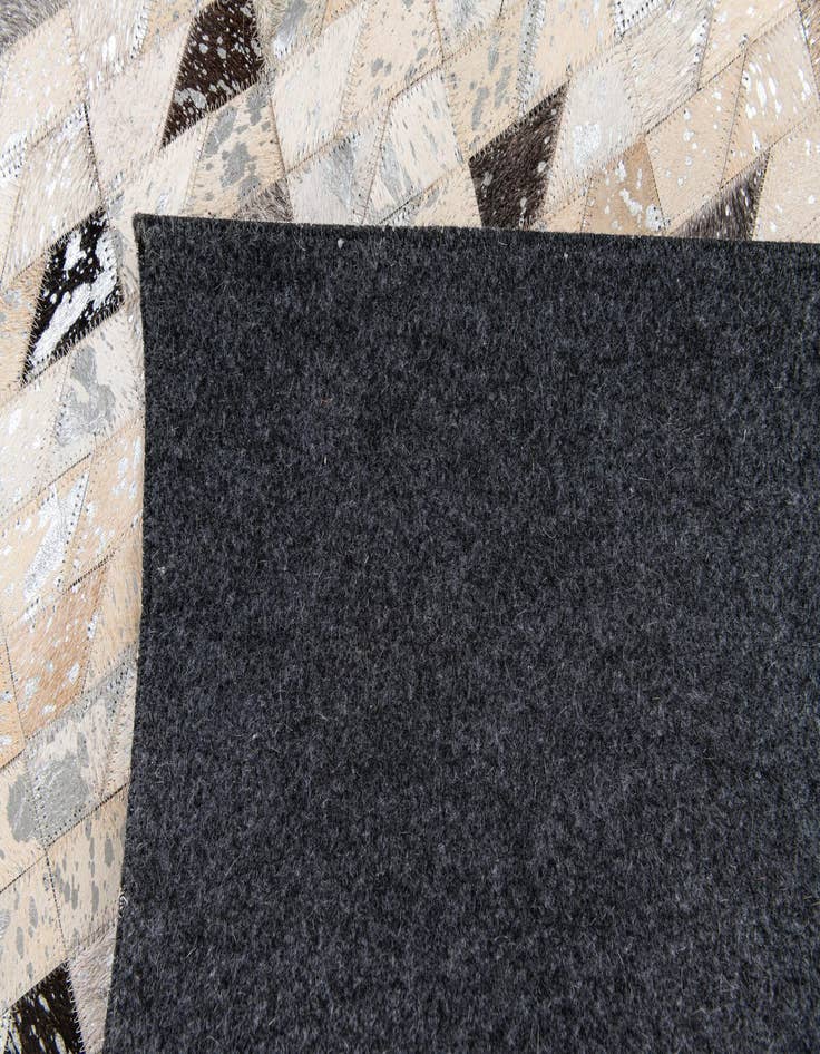 Detail image of 5' 3 x 7' 5 Cowhide Stocks Rug