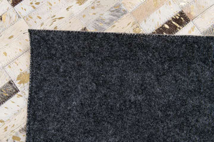 5' 2 x 7' 10 Cowhide Stocks Rug