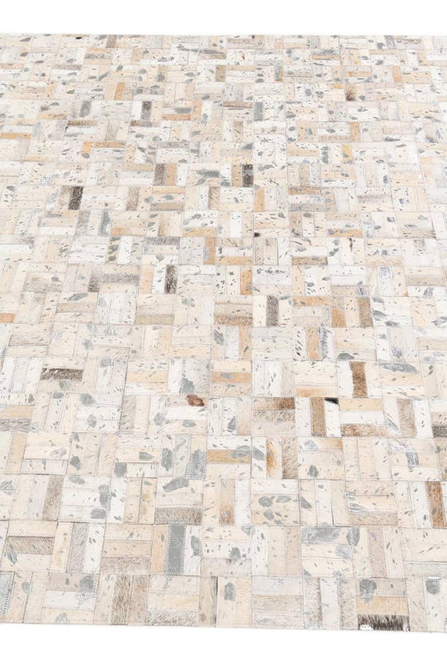 Detail image of 5' x 7' 11 Cowhide Stocks Rug