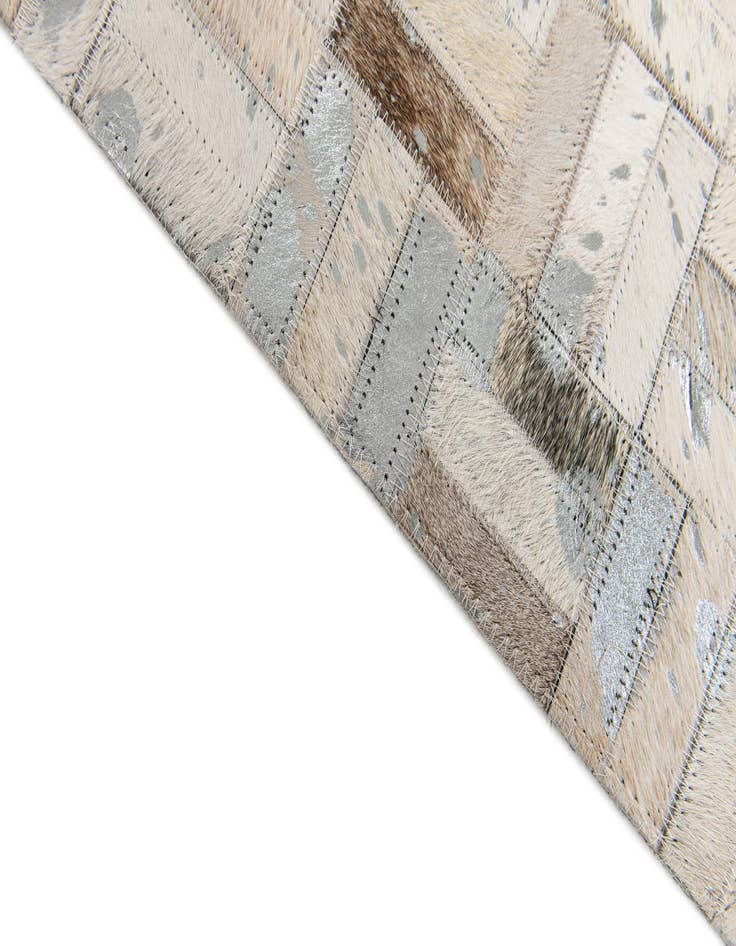 Detail image of 5' x 7' 11 Cowhide Stocks Rug