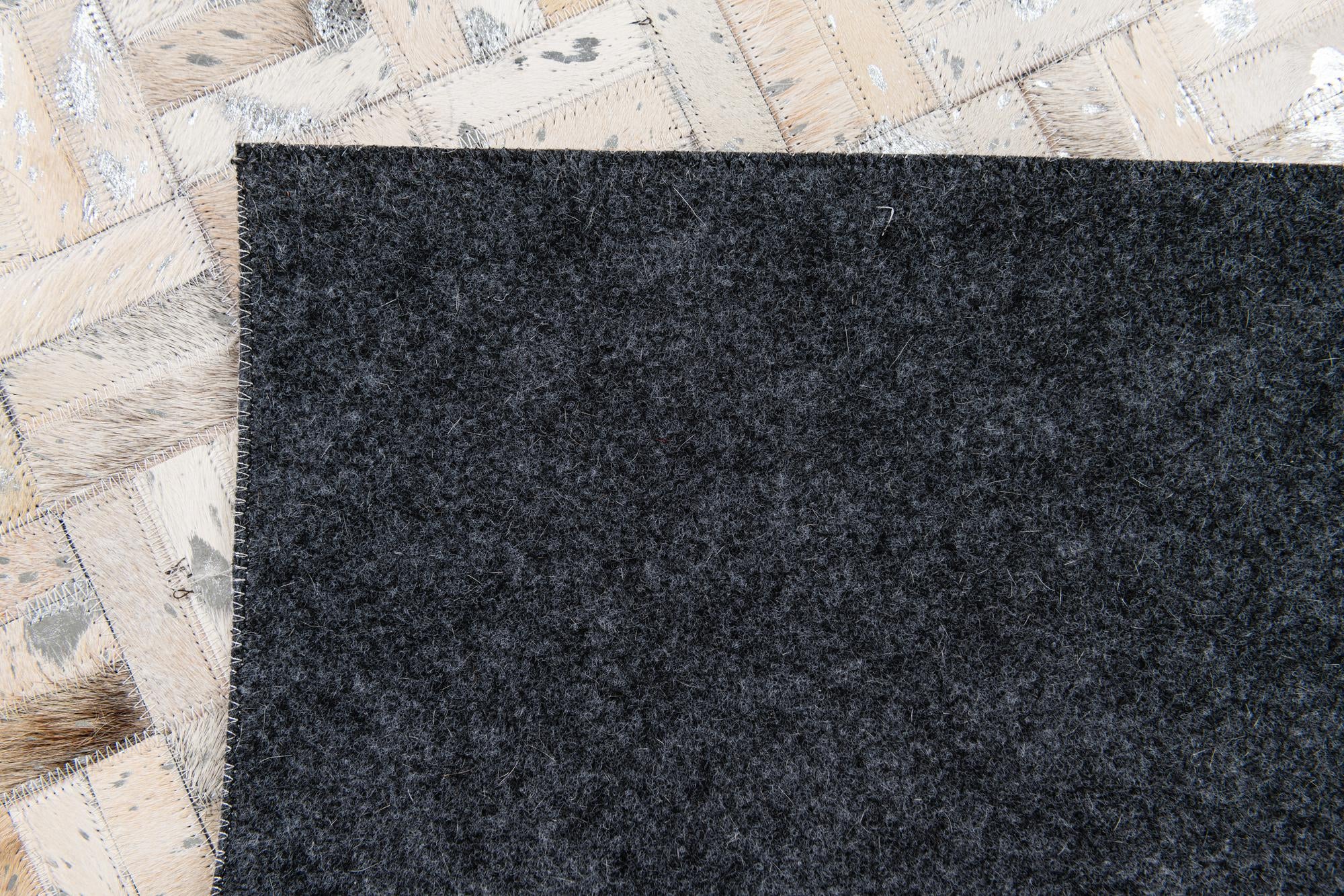 5' x 7' 11 Cowhide Stocks Rug
